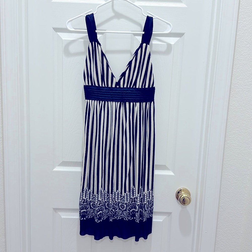 Cream and navy line above knee strap dress